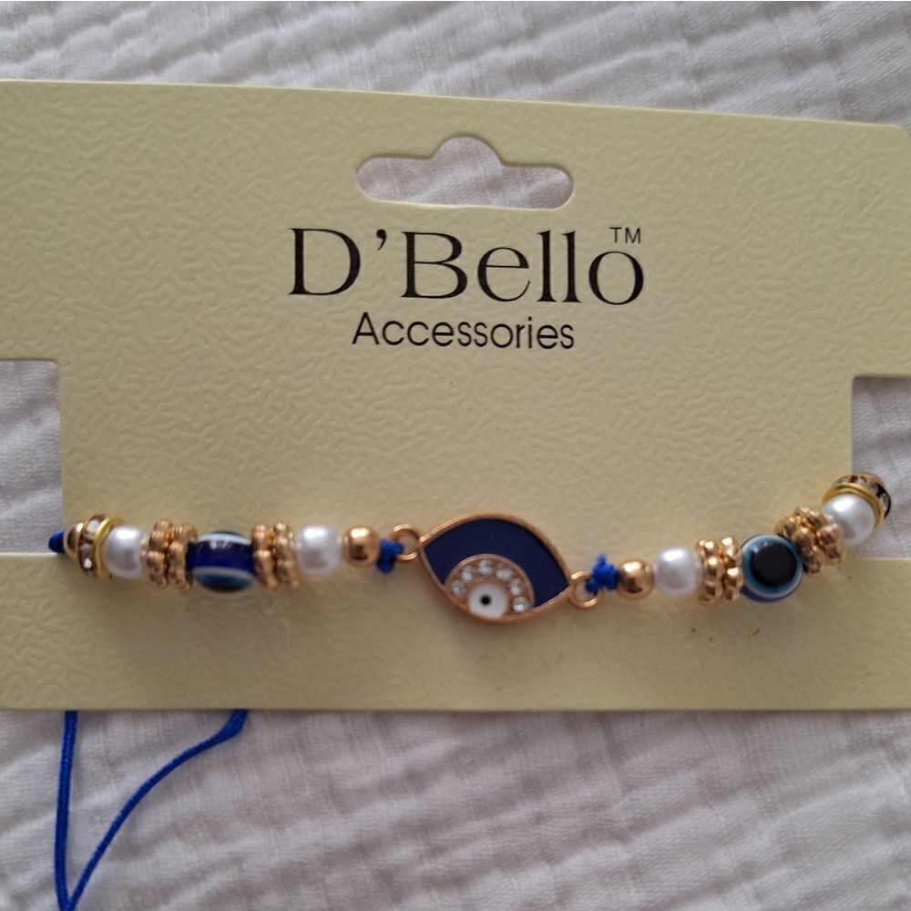 NWT Bracelet eye protection charm, stretch, god tone beads, blue, white beads
